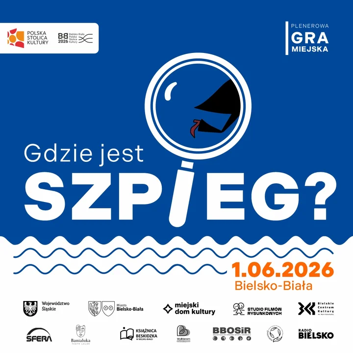 Grafika przedstawia lupę z uciekającym Szpiegiem